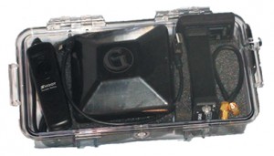 complete survey set including GNSS receiver, antenna, battery and cables, fits in a small handheld plastic case.