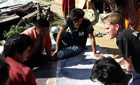 Surveyors and their global role as humanitarians