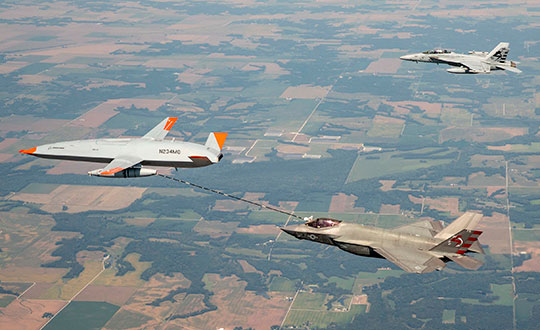Tanker drone refuels fighter jet in Navy and Boeing first