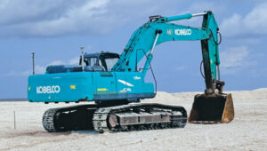 using heavy machinery among sensitive coral reefs requires careful movement and precise operations to avoid damaging them. Photo: ComNav
